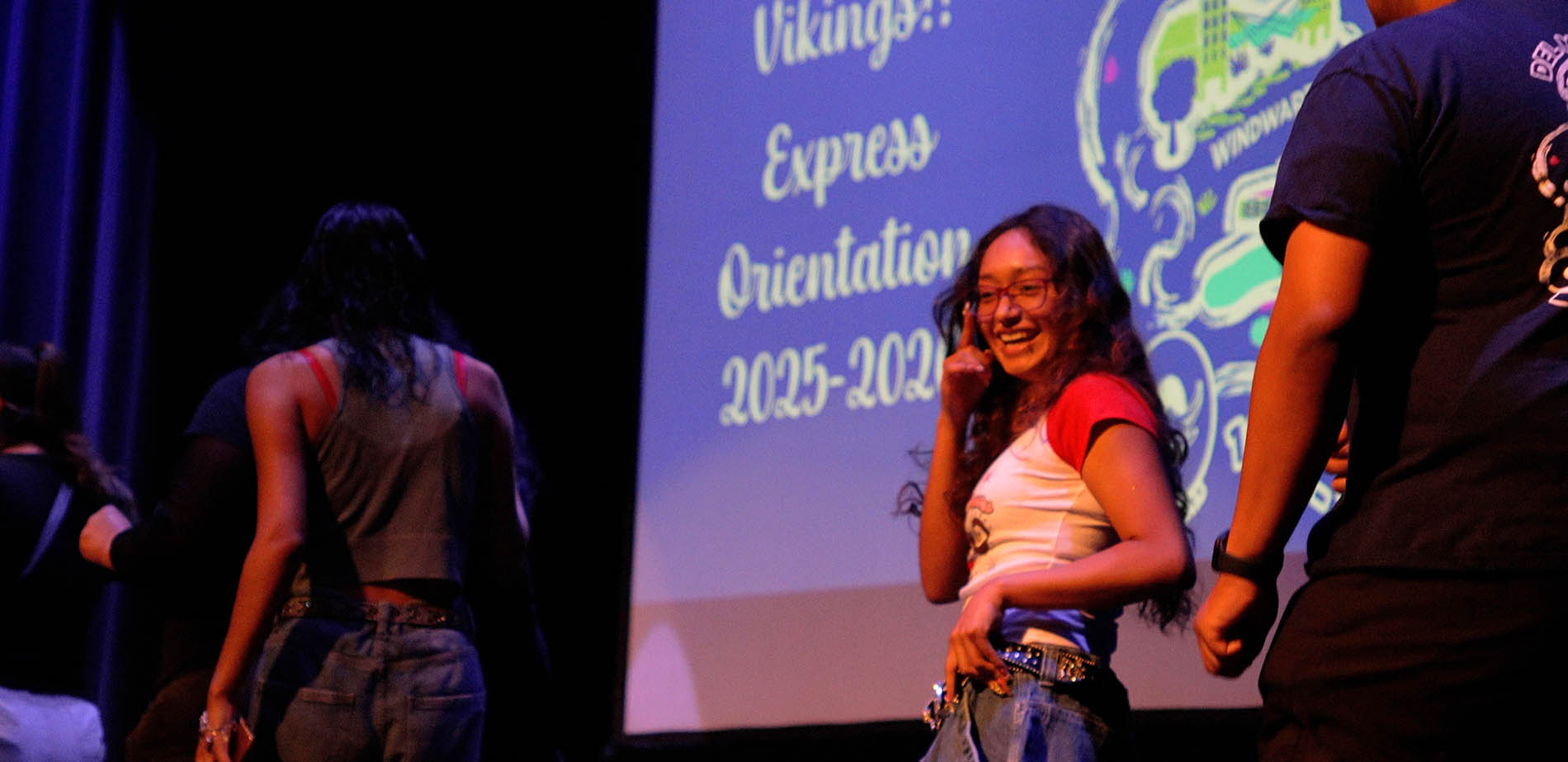Student on stage at New Student Orientation