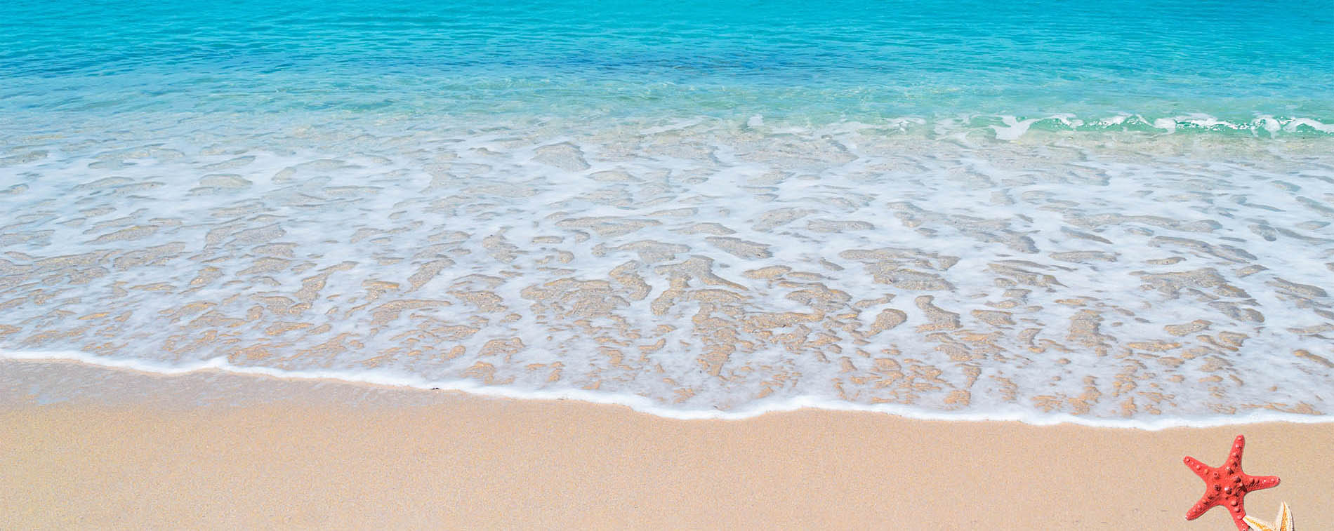 Close up of beach sand and water