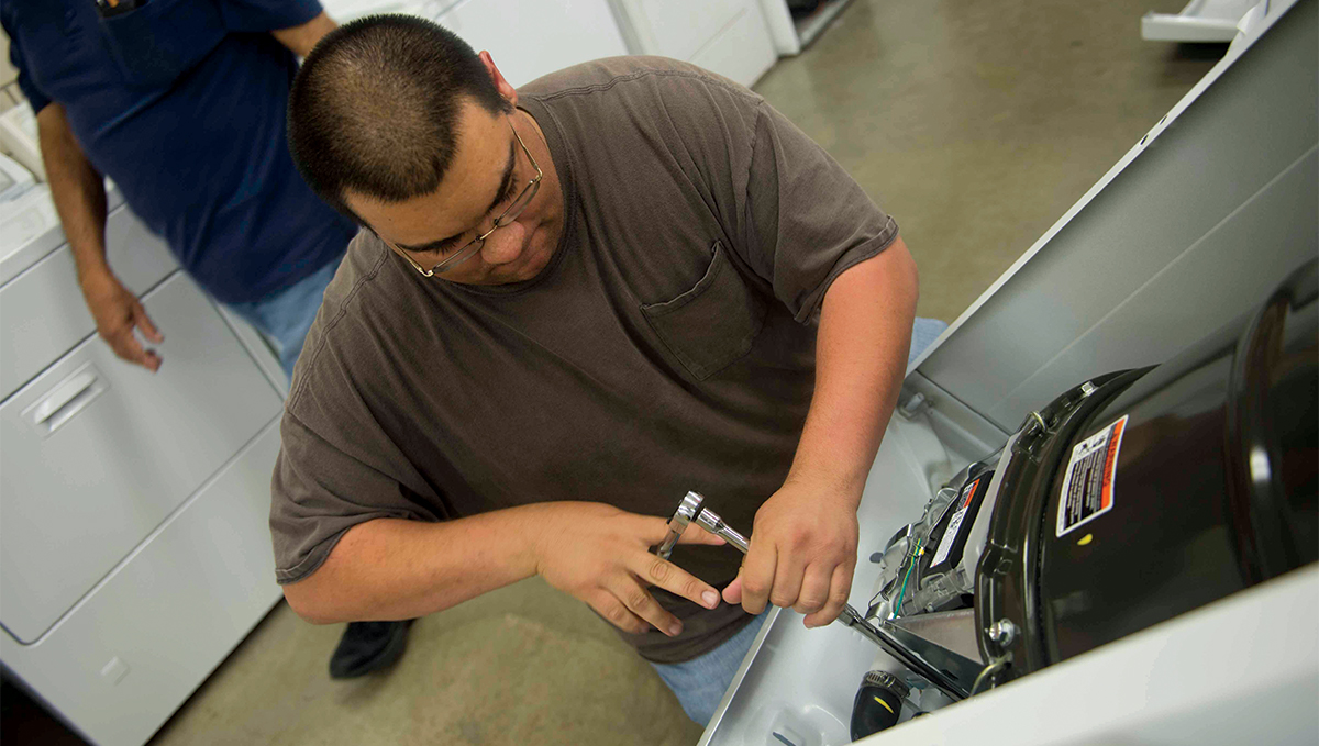 A student works on equipment