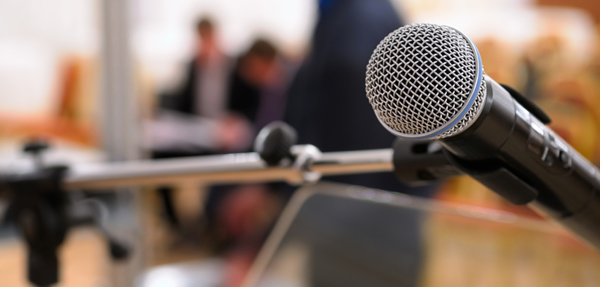 A microphone on a mic stand.