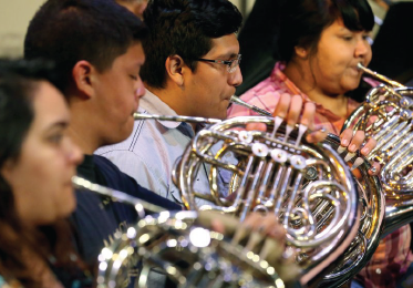 Male and Female music students perform