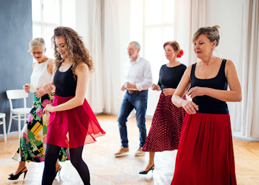 Men and women in a dance class