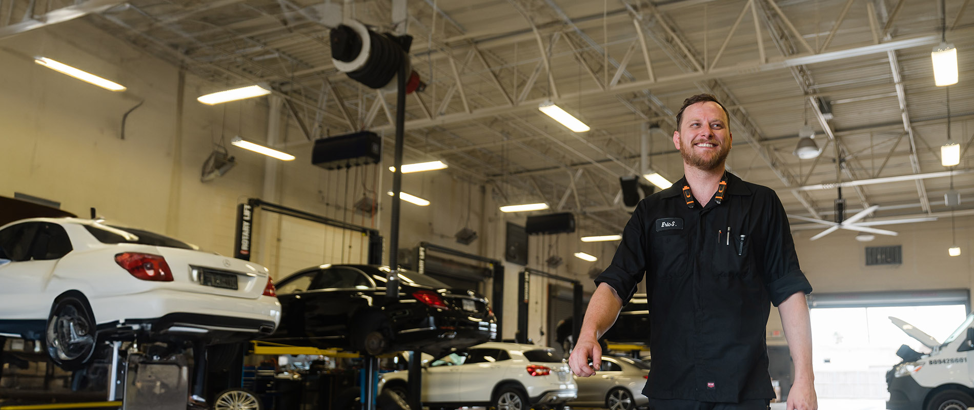 DMC graduate Eric Stern in an automotive shop