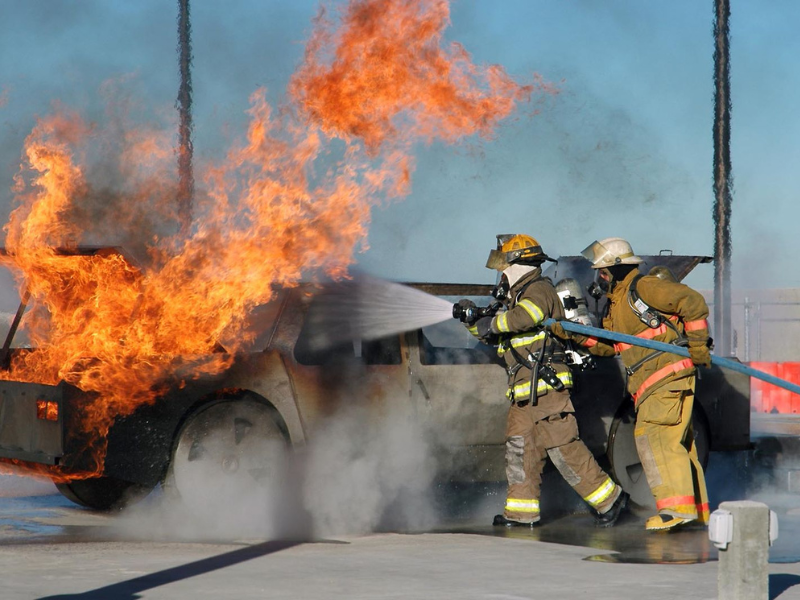 firefighters putting out fire in training class